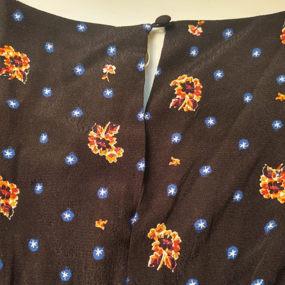 NWT FREE PEOPLE Black Floral Star Pattern Smocked Bodice Mini Dress Size XSmall - Picture 5 of 13